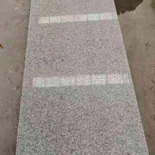 昆明芝麻白光面毛板